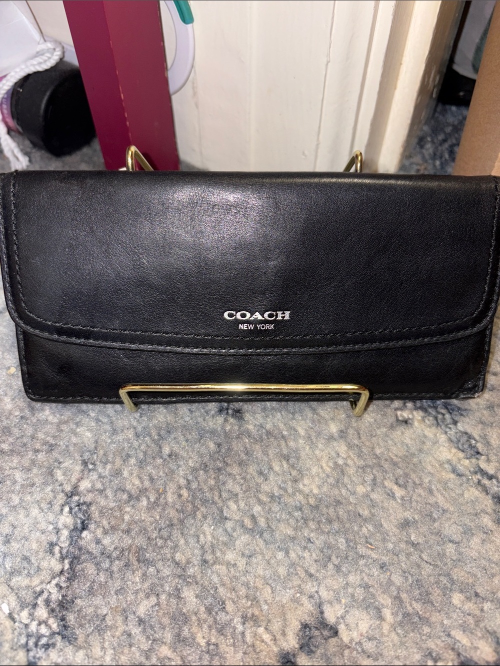COACH Black Leather Fold-Over Wallet with Silver Logo